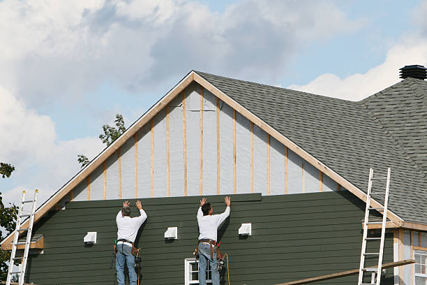 Professional Siding Contractor technician working in Martins Ferry, OH